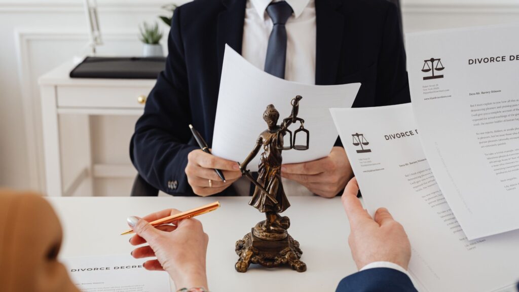 Divorce documents reviewed during a financial settlement discussion.