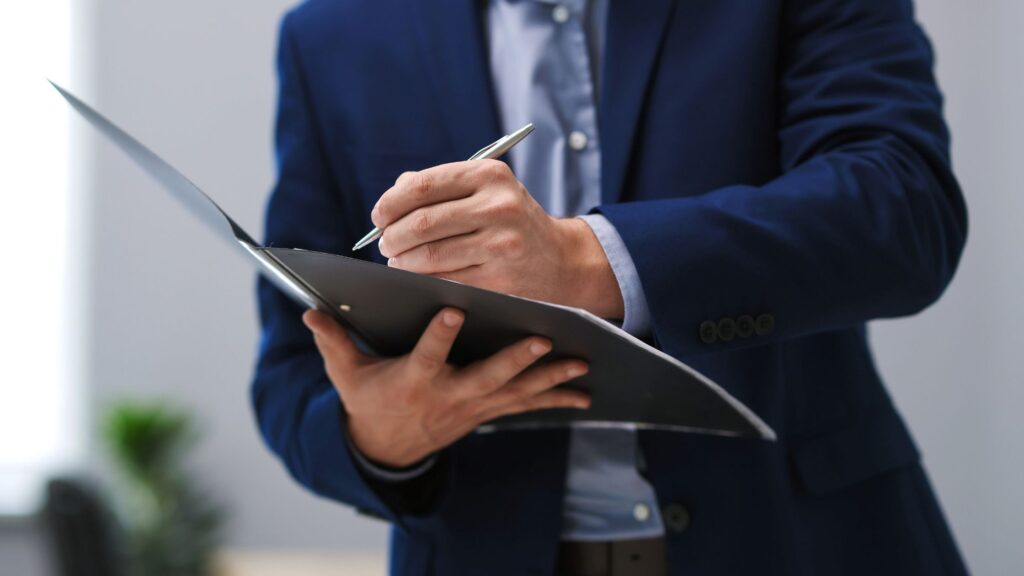 Financial professional conducting business valuation for divorce using documented financial records